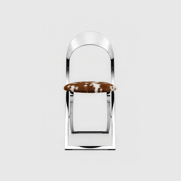 New Piece Luna Dining Chair with chrome frame and Guernsey cowhide upholstery