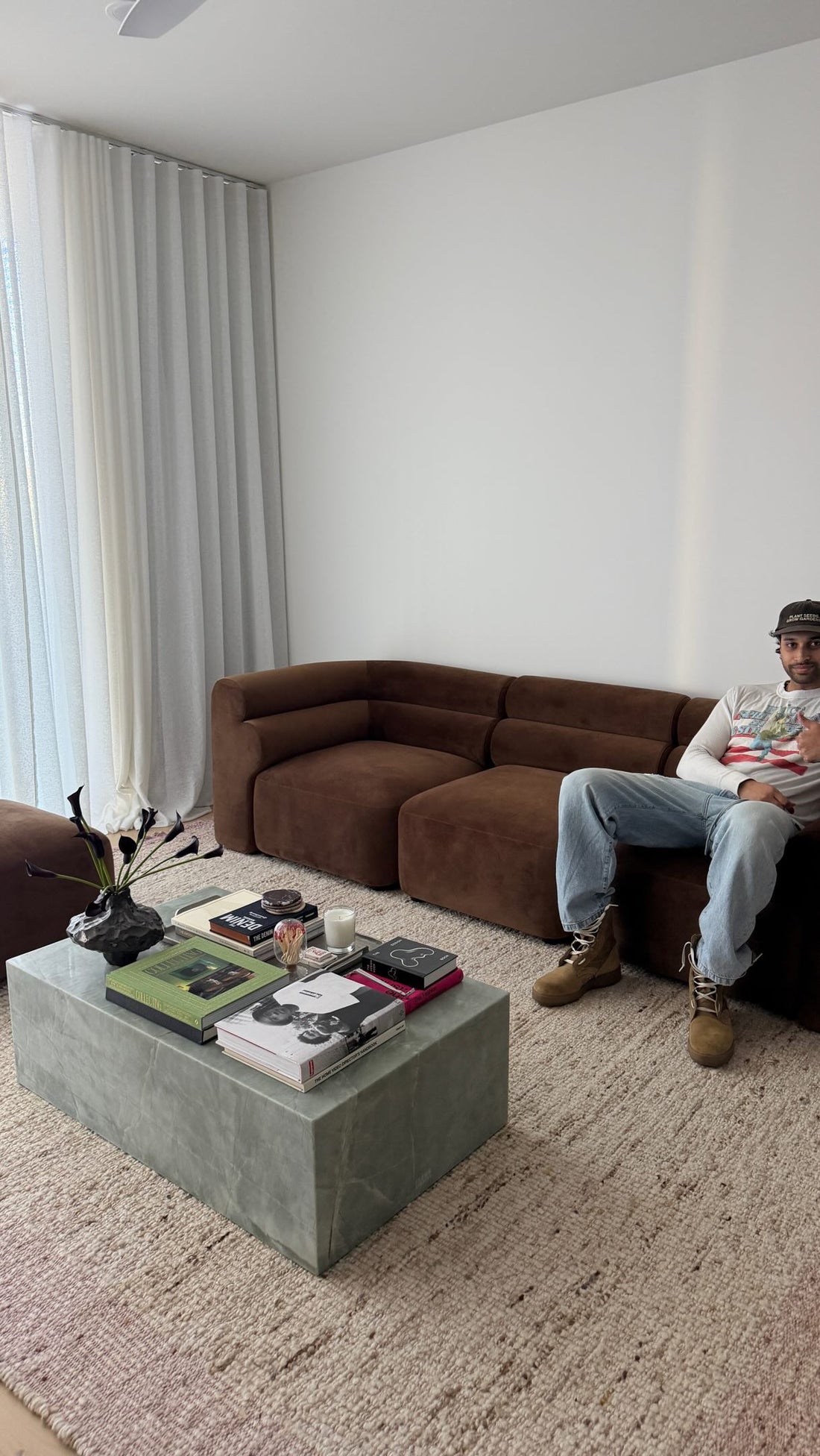 Brown modular sofa in the home of our100sqm